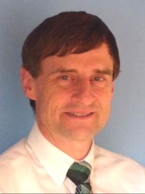 Dr.  Christian Styger